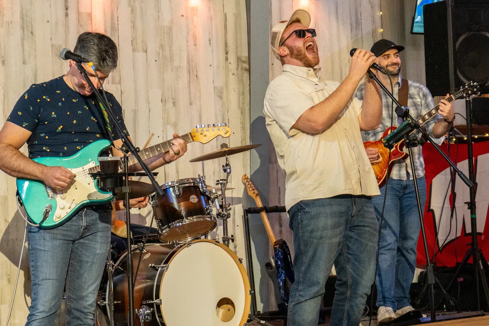 The Pipe Dream singer and guitarists performing at Rob Ray's Taproom
