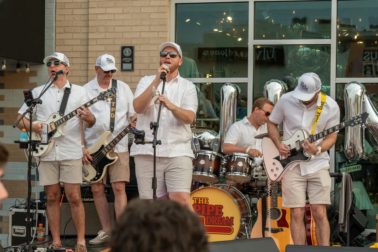 The Pipe Dream performing for the White Linen Night crowd